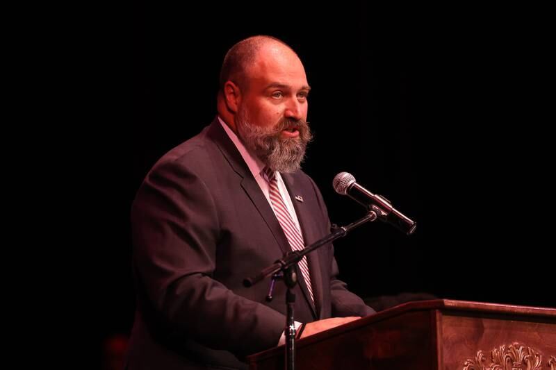 Nicholas Milissis, Chief Immigration Officer United States Citizenship and Immigration Services makes closing remarks during the Special Naturalization Ceremony held at the Rialto Square Theatre in downtown Joliet on Tuesday, April 23, 2024.