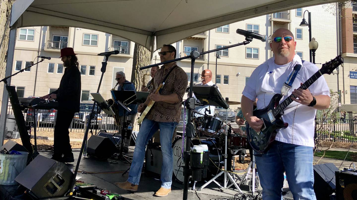 Cadillac Groove playing the main stage at the annual Wine on the Fox event at Hudson Crossing Park downtown Oswego May 7.