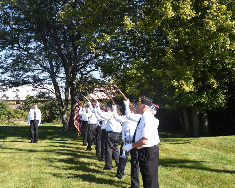 DeKalb's American Legion Honor Guard fires off a gun salute during a dedication ceremony marking the completion of phase one of the DeKalb Elks Veteran’s Memorial Plaza in DeKalb Saturday, Oct. 1, 2022.
