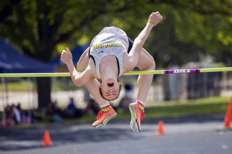 Sterling’s Abby Ryan clears the bar in the high jump to qualify for state Wednesday, May 14, 2025, during Sectionals at Sterling High School.