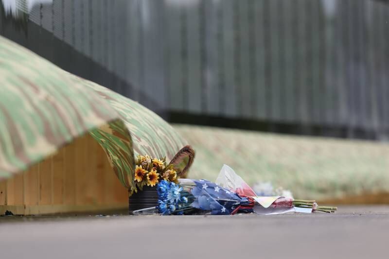 Flowers lay in front of the Vietnam Moving Wall on Saturday, July 1st, 2023, in Manhattan.