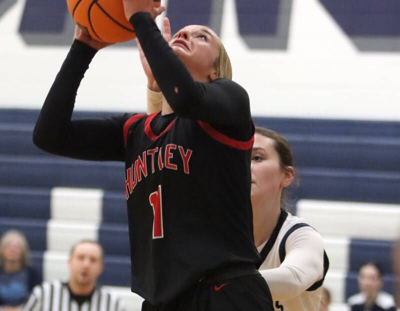 Huntley’s Anna Campanelli works under the hoop in varsity girls basketball on Friday, Jan. 24, 2025, at Cary-Grove High School in Cary.