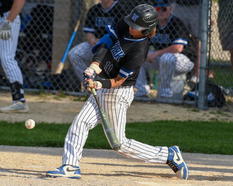 Newark's Landon Begovac (11) swings at a pitch during the game on Tuesday May 13, 2025, while traveling to take on Somonauk High School.
