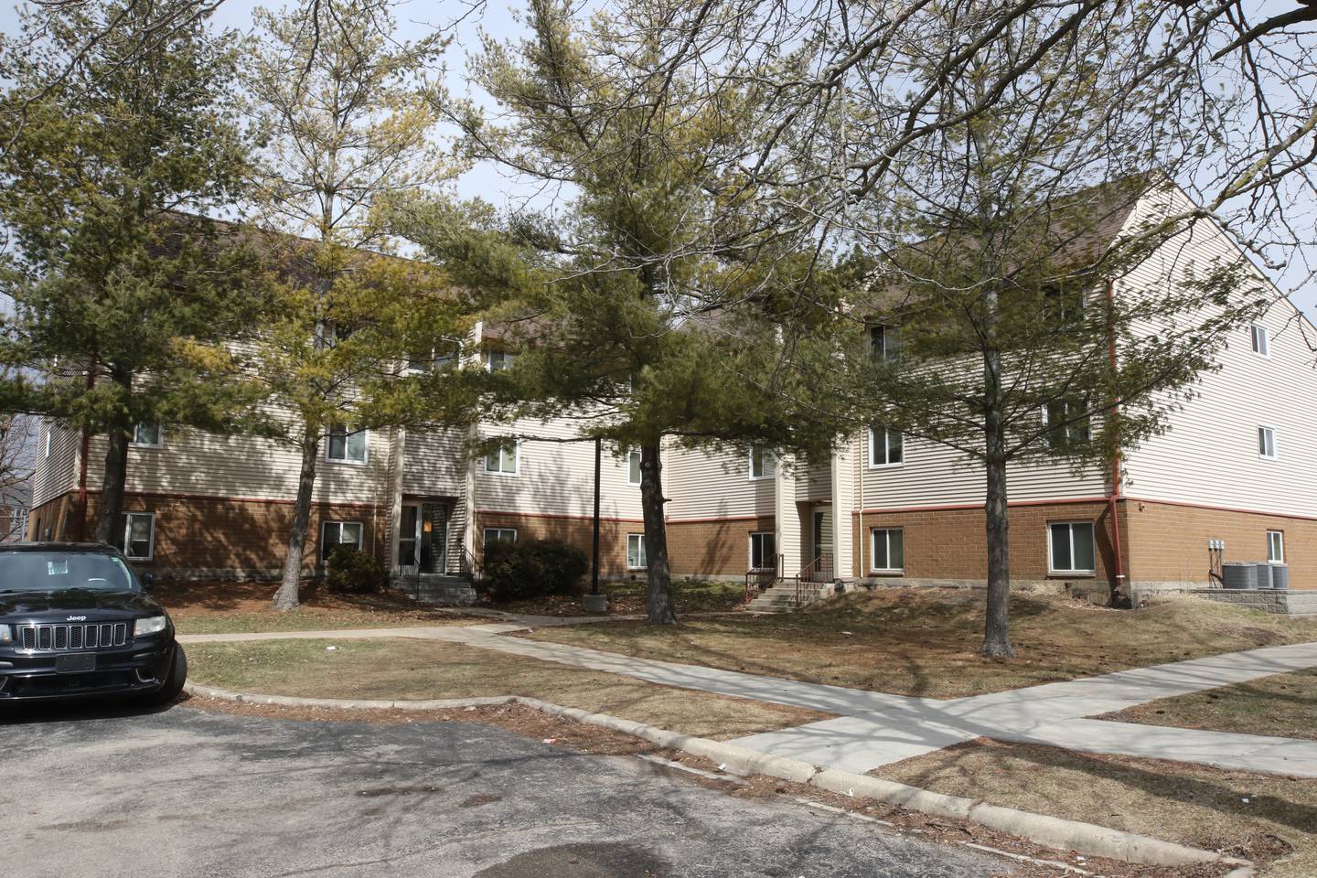 The University Village apartment building at 847 Russell Road in DeKalb where a man was fatally shot in the parking lot Sunday afternoon. Romel A. Hollingsworth Jr., 20, of the 800 block of Russell Road in DeKalb, was charged with first degree murder in the fatal shooting of 33-year-old Carl Austin, according to DeKalb County court records.