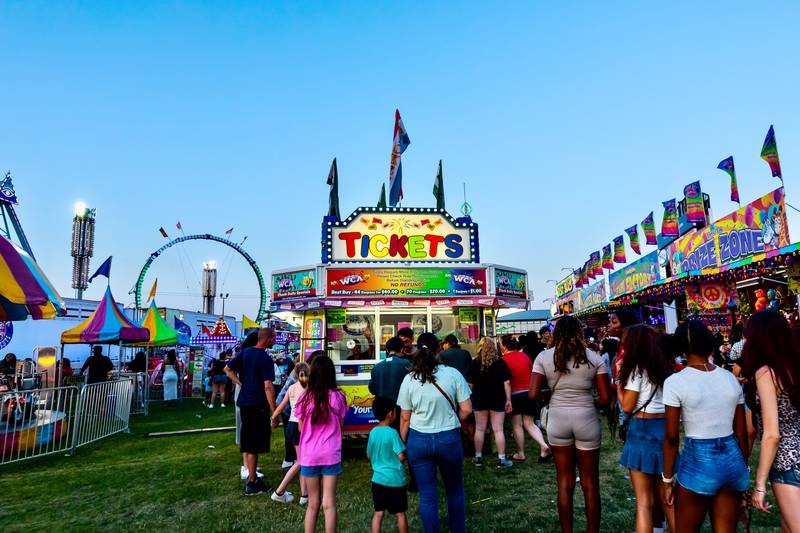 Attendees line-up to get tickets during Taste of Joliet on June 21, 2025.