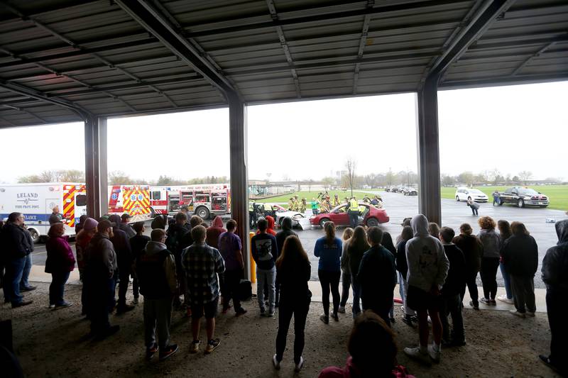 Leland High School students watch as Leland and Sheridan Fire and EMS conduct a Mock Prom drill at Leland High School on Friday, May 6, 2022 in Leland.