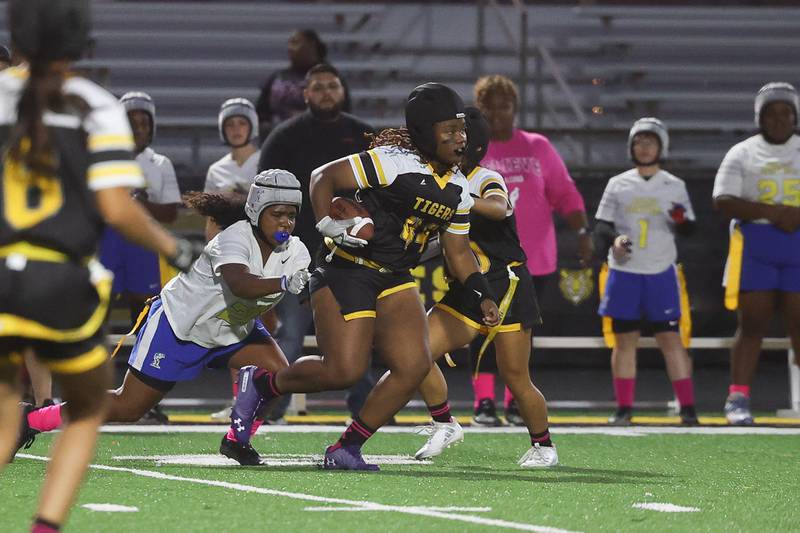 Joliet West’s Kailah Murry returns an interception against Joliet Central on Wednesday, Oct. 2, 2024 in Joliet.