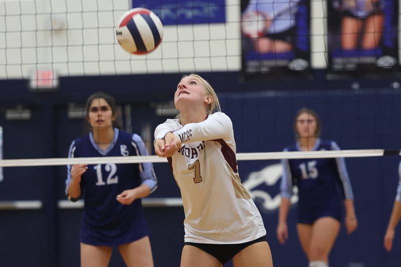 Morris’ Meg Guth keeps the volley alive against Plainfield South on Monday, Sept. 25, 2023 in Plainfield.
