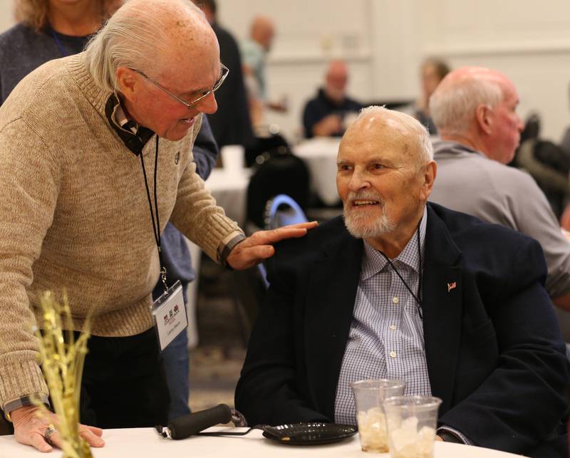 Former WLPO personalities Lanny Slevin and Joe Hogan mingle during the WLPO 75th Anniversary party on Wednesday, Nov. 16, 2022 at Senicas Oak Ridge in La Salle.