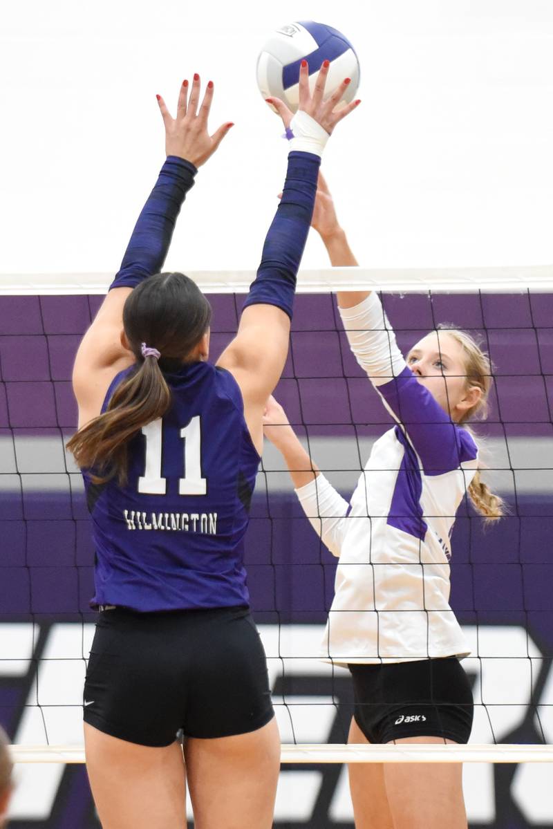 Manteno's Maddy Belisle, right, looks to send a hit past Wilmington's Molly Southall during a game at Wilmington Tuesday, Oct. 7, 2025.