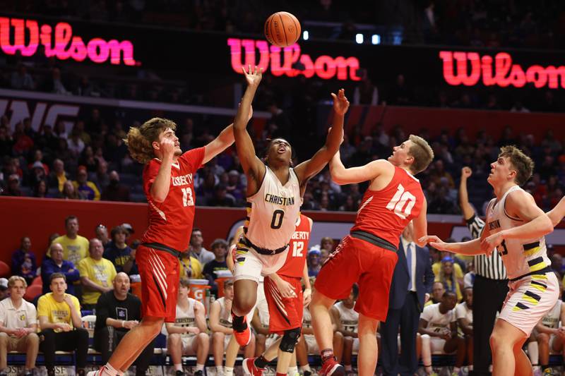 Yorkville Christian’s K.J. Vasser draws the foul going for the basket against Liberty in the Class 1A championship game at State Farm Center in Champaign. Friday, Mar. 11, 2022, in Champaign.