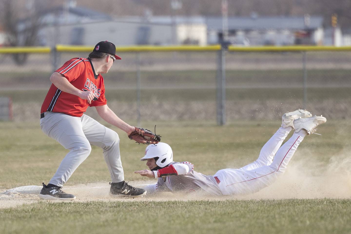 Amboy’s Carson Barlow is late on the tag against Oregon’s Avery Lewis Thursday, March 21, 2024 in Oregon.
