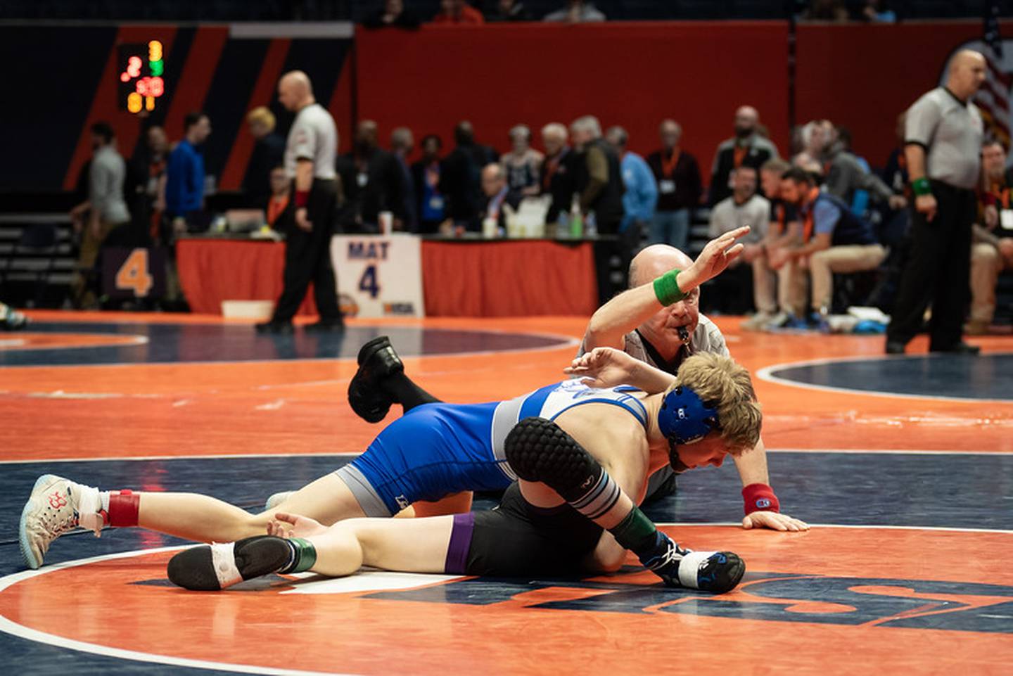 Princeton sophomore Augustus Swanson works on a pinfall over Oakwood freshman Steven Uden in a first-round match at state. Swanson finished fifth at 106 pounds.