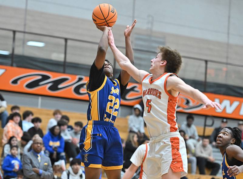 Joliet Central's Amarion Bradley (22) shoots a three point basket during the 4A Lockport Regional game against Lincoln-Way West on Monday, FEB. 23, 2026, at New Lenox.