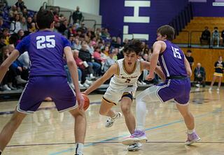 Sterling's JP Schilling handles the ball against Rochelle in the regional finals Friday, Feb. 25, 2022.