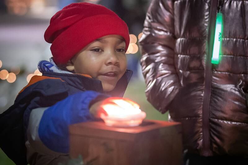 Kassius White, 6, of Dixon had the honor of pressing the button to light the tree at the KSB tree lighting ceremony ro start the Dixon Christmas Walk Friday, Dec. 2, 2022.