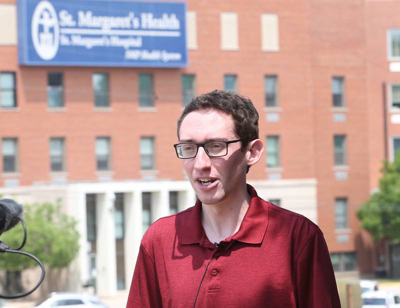 Brent Bader Director of Public Relations and Community Development for the City of La Salle, speaks to reporters outside St. Margaret's Health on Friday, June 16, 2023 in Spring Valley.