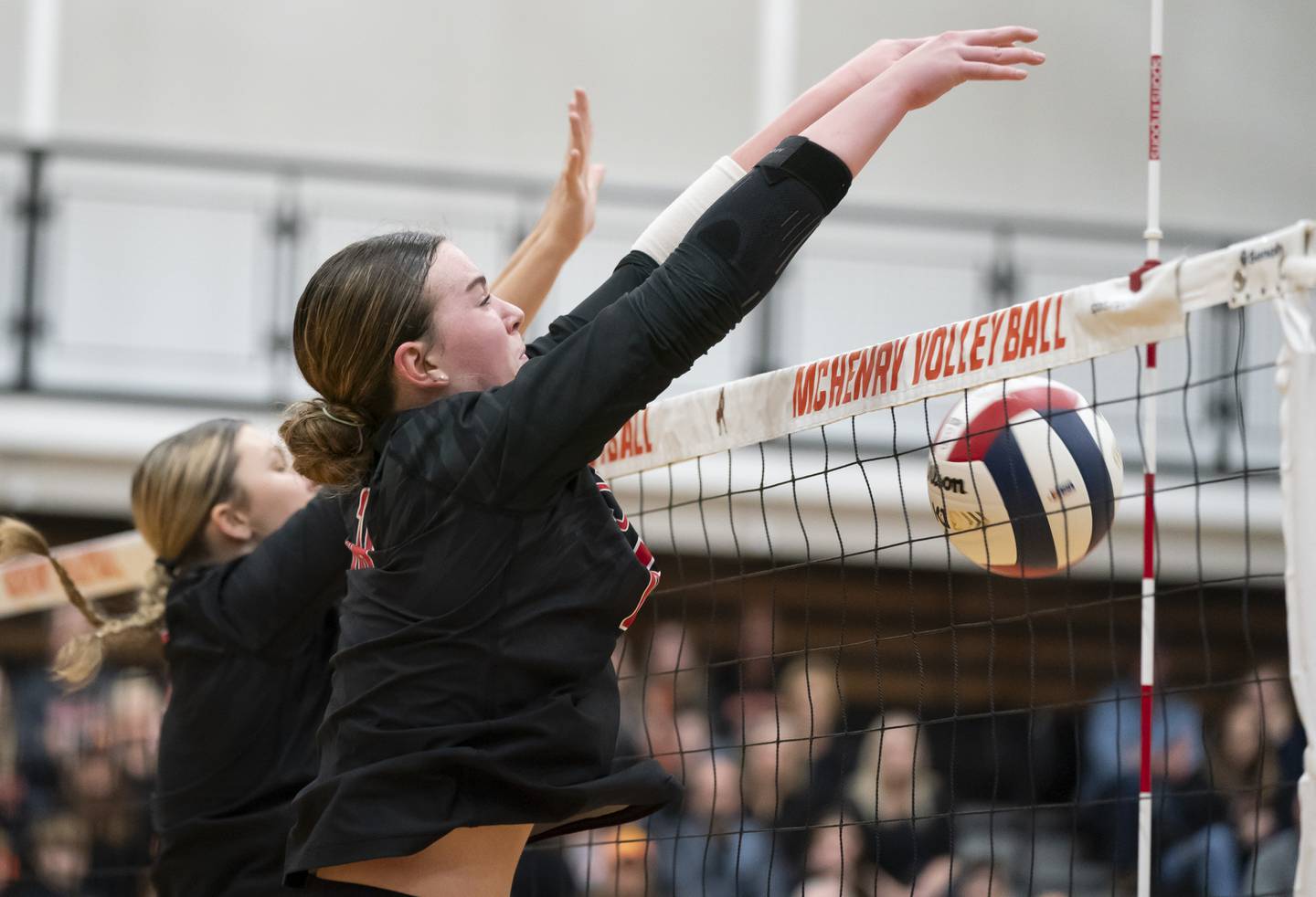 Huntley's Georgia Watson blocks the ball during the Class 4A Sectional girls volleyball final against Libertyville on Thursday, November 7, 2024 at McHenry High School. Ryan Rayburn for Shaw Local
