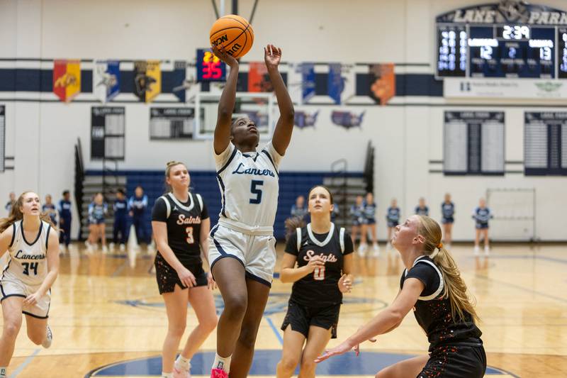 Lake Park's Laila Anderson goes in for the layup against St. Charles East on Wednesday, Jan.7,2026 in Roselle.