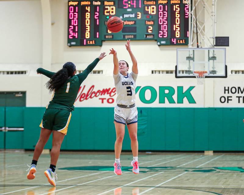Oswego East's Maggie Lewandowski (3) shoots a jump shot at the York Thanksgiving Tournament. Nov 13, 2023.