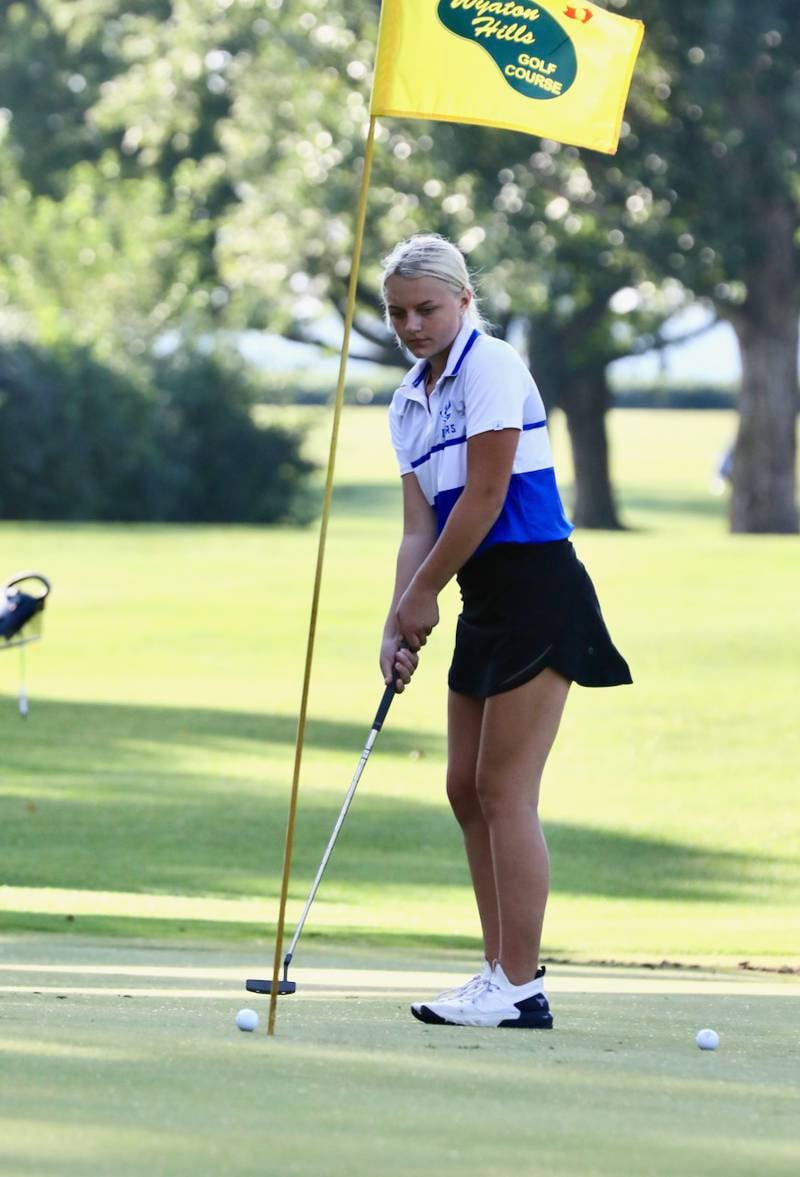Princeton's Addie Hecht chips on to the green during Thursday's meet at Wyaton Hills.