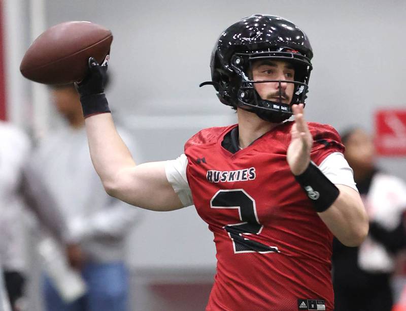 Northern Illinois University quarterback Ethan Hampton throws a pass Tuesday, March 26, 2024, during spring practice in the Chessick Practice Center at NIU.