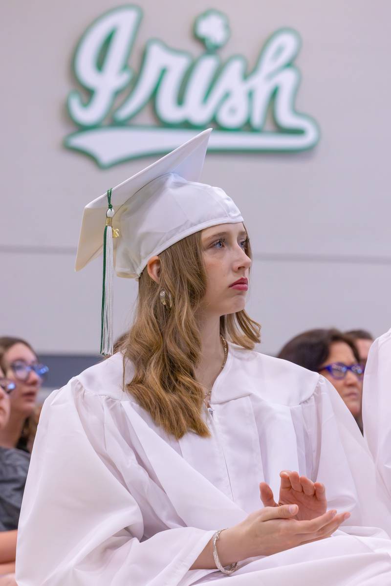 Sara Morrison gives applause after a speech during the Seneca High School Class of 2026 Graduation on May 17, 2026 at Seneca High School.