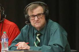 ‘Brownie’ hanging up mike, stats sheets after 50 years  