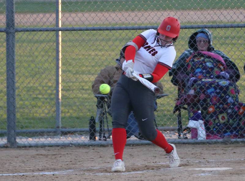 Ottawa's McKenzie Oslanzi hits a triple  against Plano on Thursday, April 6, 2023 at King Field in Ottawa.