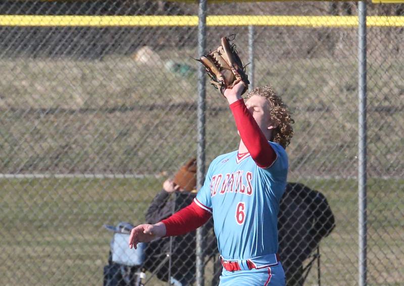 Hall's Mac Resetich makes a catch in center field against Ottawa on Tuesday, March 28, 2023 at Ottawa High School.