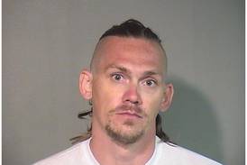 Police say Woodstock man gave fake name while carrying meth, cocaine