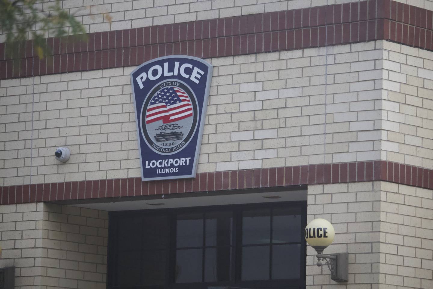 A sign at the entrance for the Lockport Police Department.