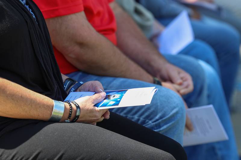 Kathleen Rittmanic-Emme, sister of fallen Bradley Police Sgt. Marlene Rittmanic, wears memorial bracelets in her honor during the Kankakee County Law Enforcement Memorial on Thursday, May 14, 2026, at the Kankakee County Courthouse.