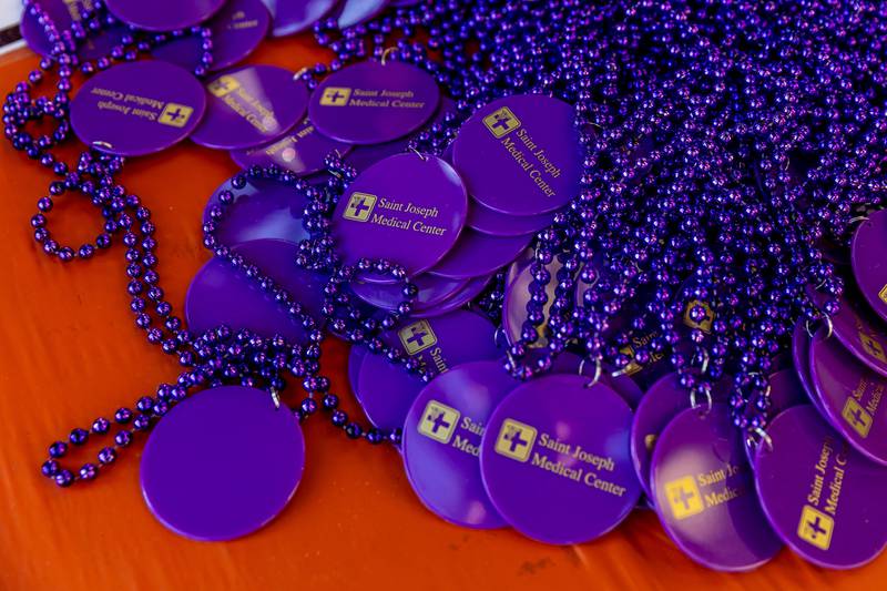 Mardi Gras style beads add to the fun during New Orleans North Festival at Joliet Slammers Stadium on Aug. 15, 2025.
