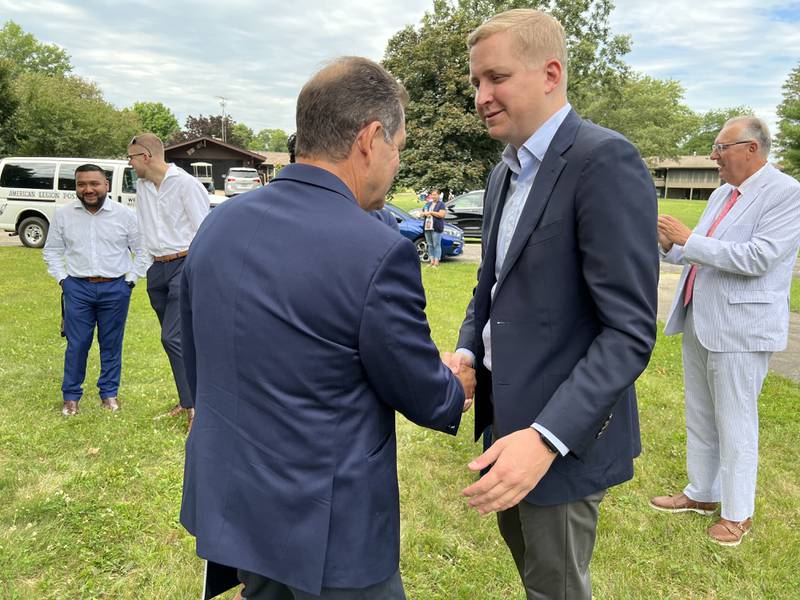 On Aug. 11, 2022 U.S. Rep. Jesus “Chuy” Garcia and state Rep. Tom Demmer, R-Dixon greet each other in Shabbona. The two elected officials were in DeKalb County to speak to discuss H.R. 8380 Prairie Band Potawatomi Nation Shab-eh-nay Band Reservation Settlement Act of 2022.