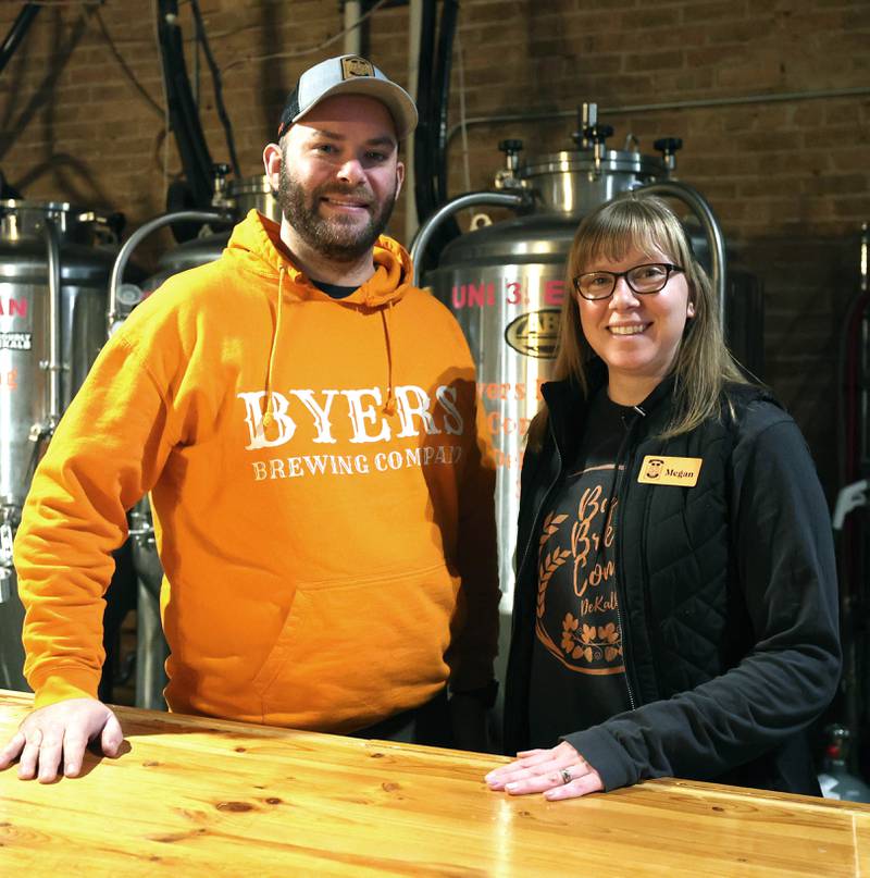 Steve and Megan Byers, co-owners of Byers Brewing Company, in the brewing area Friday, Jan. 6, 2023, at the brewery and taproom in DeKalb. Byers is planning an expansion of its operations to include another location,  216 N. Sixth St., in DeKalb for production only.