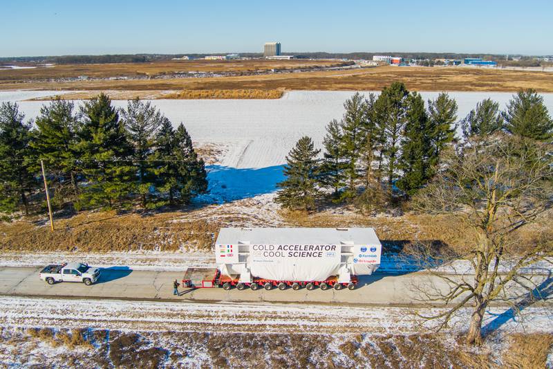 Fermi National Accelerator Laboratory (Fermilab) moved a 95-ton coldbox on Wednesday, Jan. 15, 2025, following a two month journey from France to Batavia. The coldbox is a crucial piece of equipment for the lab’s new Proton Improvement Plan II (PIP-II) particle accelerator project.