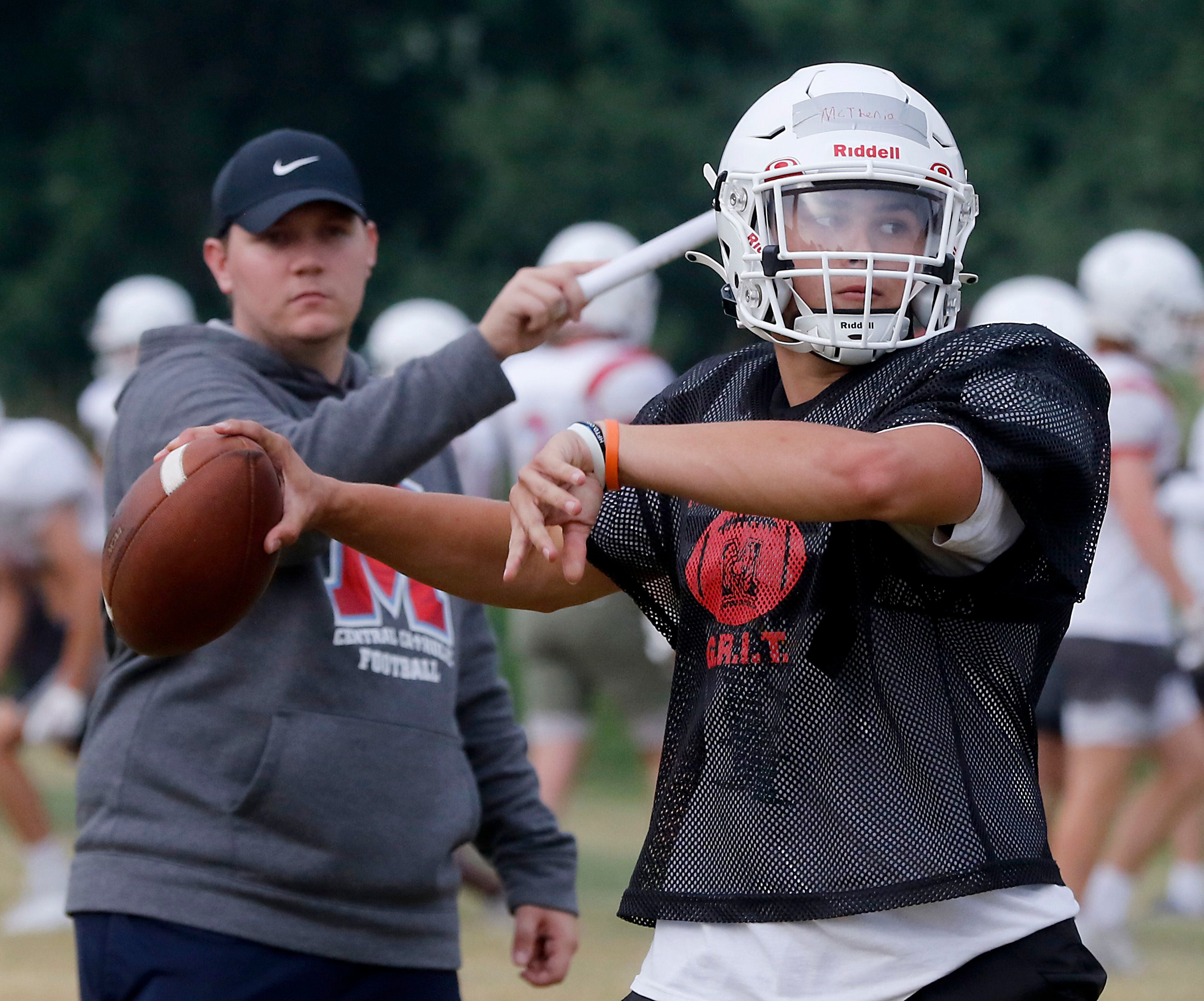 Marian Central’s Cale McThenia throws the football during summer football practice Monday, June 26, 2022, at Marian Central Catholic High School in Woodstock.