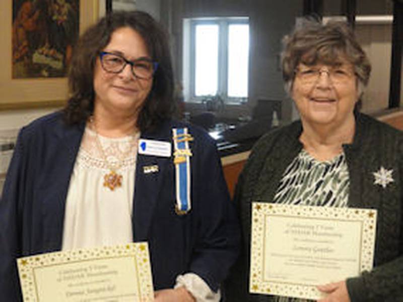 Donna Jungnickel and Nora Geuther of the Fort du Rocher Chapter of the Daughters of the American Revolution of Mendota received certificates as five-year members. Audrey Sauter is not pictured.