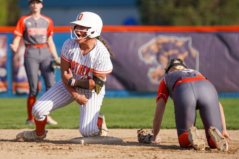 Oswego’s Kiyah Chavez (10) reacts after reaching second on a two run double against Minooka during a Southwest Prairie Conference softball game at Oswego High School on Wednesday, April 23, 2025.