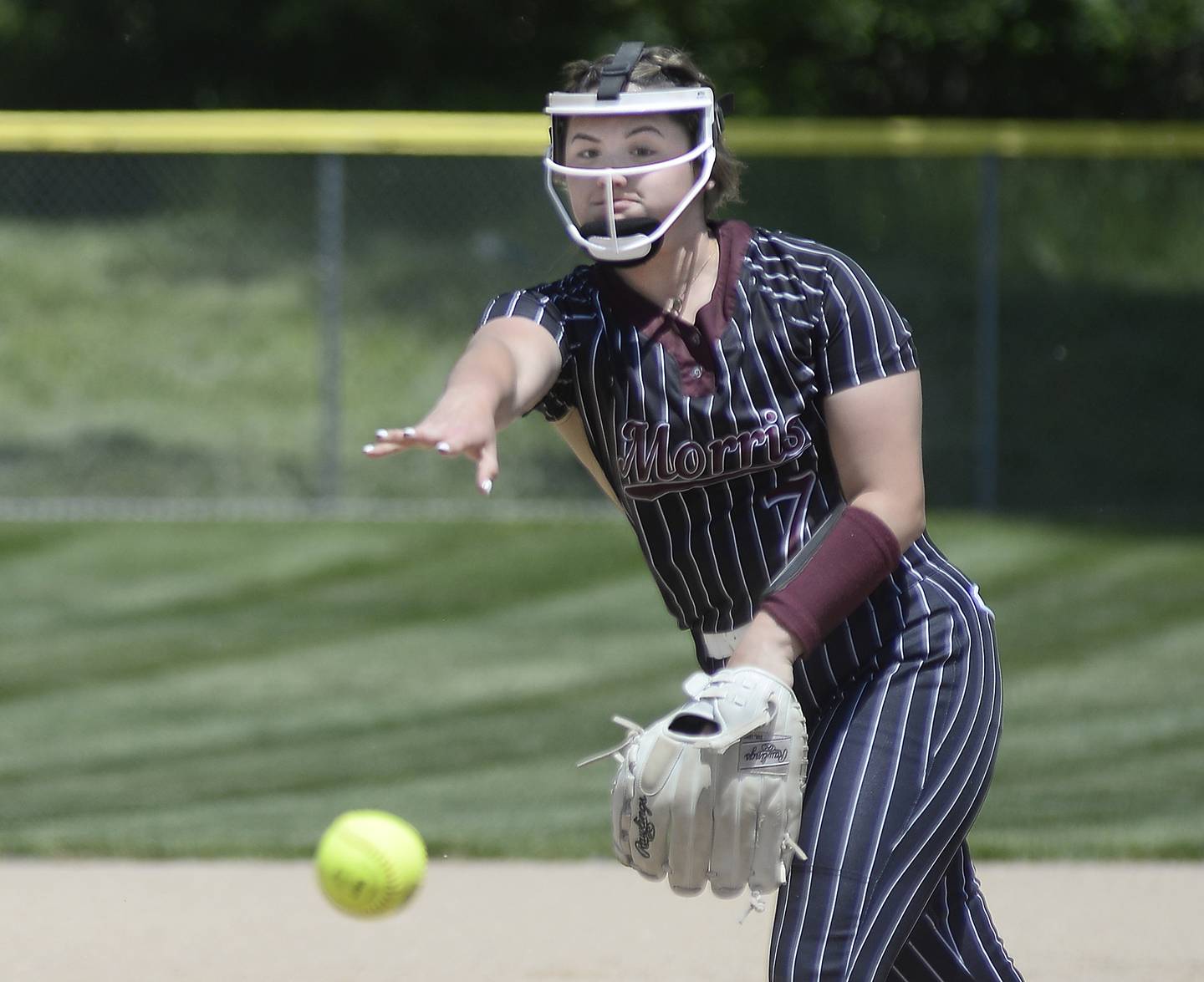 Morris pitcher Ella Davis delivers home during the Class 3A Ottawa Regional championship game Saturday, May 27, 2023.