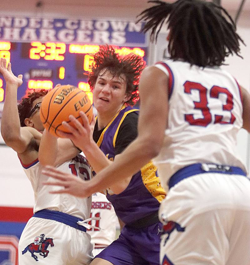 Wauconda’s Tony Salemi navigates heavy traffic in varsity basketball Friday, Dec. 20, 2024 at Dundee-Crown High School in Carpentersville.