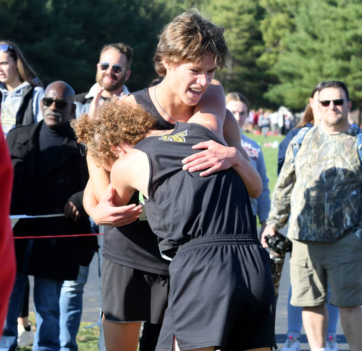 Riverdale's Tommy Murray and Landis Musser embrace after finishing 1-2 at the 1A Oregon Sectional on Saturday, Oct. 29 at Oregon Park West.