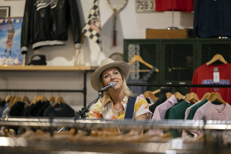 Nashville singer and Dixon native Gina Venier plays a special showing at Rack City Saturday, July 1, 2023 in Dixon. Rack City is a thrift shop opened by Hannah Wilson located at 116 East First Street. Venier will also appear on stage at Petunia Fest Sunday night.