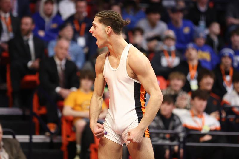 Dekalb’s Tommy Curran celebrates a win over Moline’s Noah Tapia in the Class 3A 145lb. championship match at State Farm Center in Champaign. Saturday, Feb. 19, 2022, in Champaign.