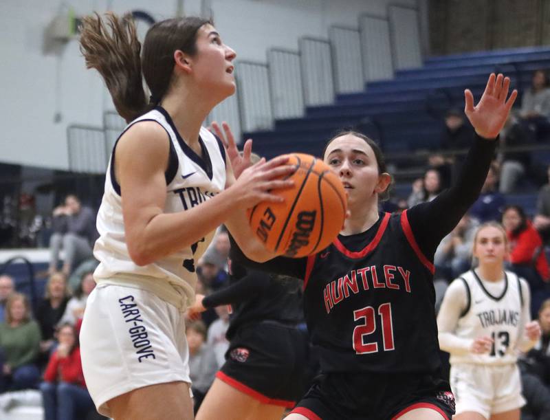 Huntley’s Luca Garlin, right, guards Cary-Grove’s Kennedy Manning in varsity girls basketball on Friday, Jan. 24, 2025, at Cary-Grove High School in Cary.
