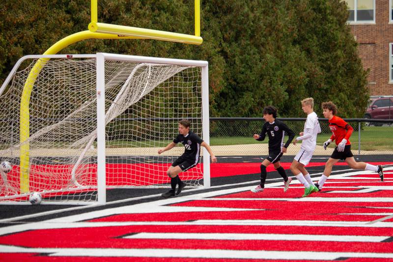 Manteno's Ben Froeschle scores a goal to take the lead over Reed-Custer during Manteno's 3-0 victory in the Class 1A Momence Regional championship on Saturday, Oct. 25, 2025.