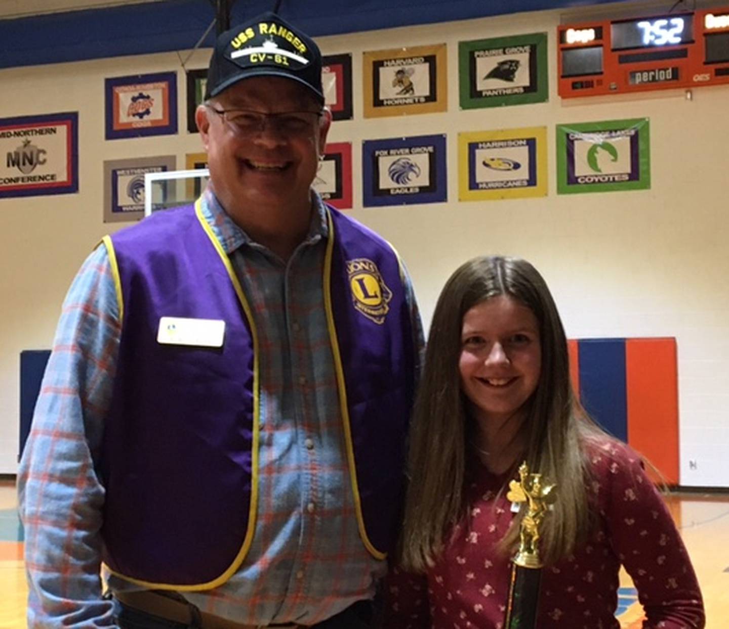 (Left to right); Genoa Lions Clubs president Ron Sheahan and Scripps Spelling Bee first place winner Alayna Johnson