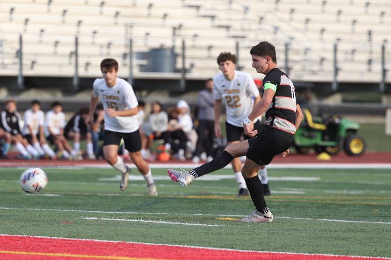 Lincoln-Way Central’s Jamison Stockrahm scores on the penalty kick against Joliet West in the Class 3A Lincoln-Way Central Regional semifinal on Tuesday, Oct. 22, 2024 in New Lenox.