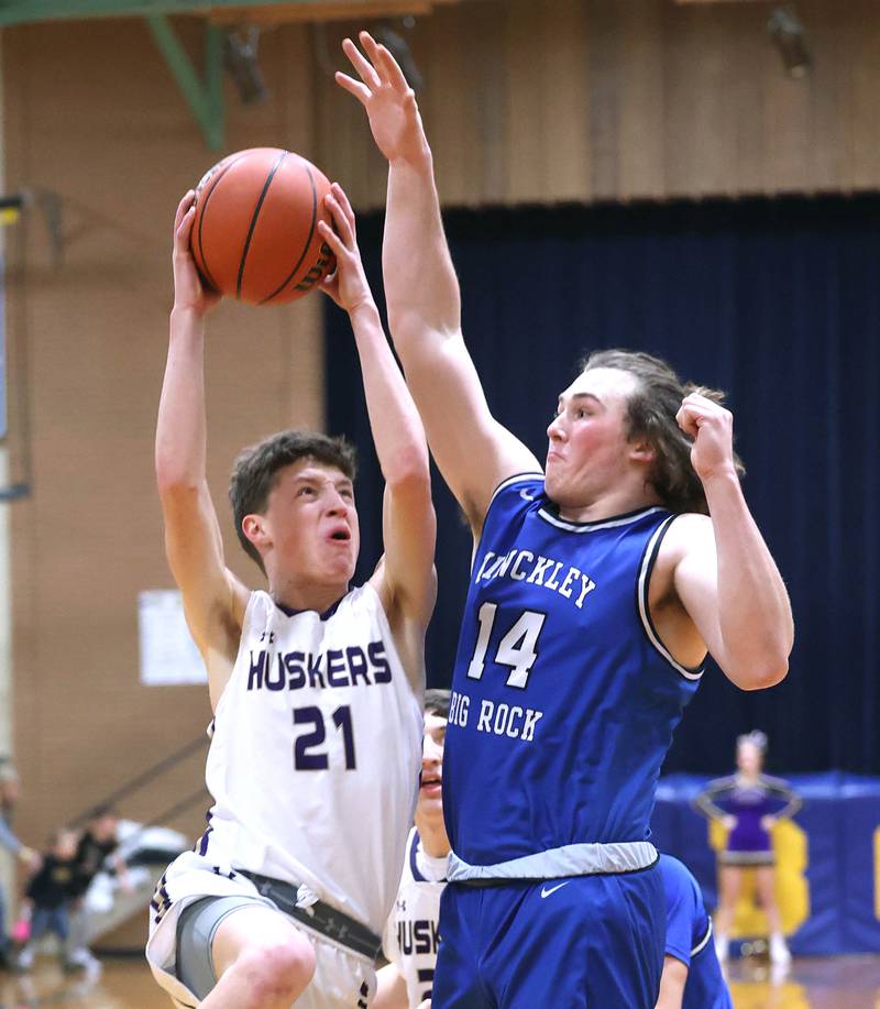 Serena's Braxton Hart goes to the basket against Hinckley-Big Rock's Martin Ledbetter Friday, Feb. 3, 2023, during the championship game of the Little 10 Conference Basketball Tournament at Somonauk High School.